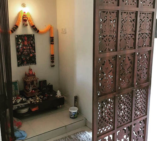 Puja room with Lattice door